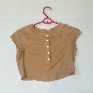 Tan urban outfitters t shirt. Never worn